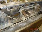 Used Krones Canmatic Rotary Hot Glue Wraparound Labeler. 18 hd Capable of running up to 600 cpm. Container size range: 50-110mm diameter, 50-250mm or 150-350mm height. 18 head unit set on 126mm pitch...