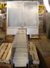 Used Krones Canmatic Rotary Hot Glue Wraparound Labeler. 18 hd Capable of running up to 600 cpm. Container size range: 50-110mm diameter, 50-250mm or 150-350mm height. 18 head unit set on 126mm pitch...
