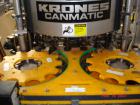 Used Krones Canmatic Rotary Hot Glue Wraparound Labeler. 18 hd Capable of running up to 600 cpm. Container size range: 50-110mm diameter, 50-250mm or 150-350mm height. 18 head unit set on 126mm pitch...