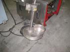 Used Krones Rotina I Wraparound Cold Glue Labeler. Cable of speeds up to 80 bottles per minute on wraparound or 100 bottles per minute on spot labels. Has a label size range: length 2