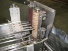 Used Krones Rotina I Wraparound Cold Glue Labeler. Cable of speeds up to 80 bottles per minute on wraparound or 100 bottles per minute on spot labels. Has a label size range: length 2