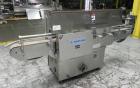 Used New Jersey Machine Mustang II Automatic Glue Labeler capable of speeds up to 250 labels per minute. Has a label size range: length 2-1/2
