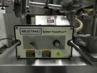 Used New Jersey Machine Mustang II Automatic Glue Labeler capable of speeds up to 250 labels per minute. Has a label size range: length 2-1/2