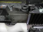 Used New Jersey Machine Mustang II Automatic Glue Labeler capable of speeds up to 250 labels per minute. Has a label size range: length 2-1/2