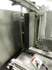 Used New Jersey Machine Mustang II Automatic Glue Labeler capable of speeds up to 250 labels per minute. Has a label size range: length 2-1/2