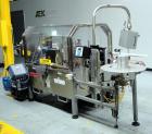 Used Trine Model 4500CE Roll Fed Wraparound Hot Melt Labeler