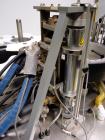 Used Trine Model 4500CE Roll Fed Wraparound Hot Melt Labeler