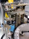 Used Trine Model 4500CE Roll Fed Wraparound Hot Melt Labeler