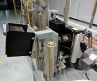 Used Trine Model 4500CE Roll Fed Wraparound Hot Melt Labeler
