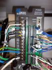 Used Trine Model 4500CE Roll Fed Wraparound Hot Melt Labeler