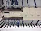 Used Trine Model 4500CE Roll Fed Wraparound Hot Melt Labeler