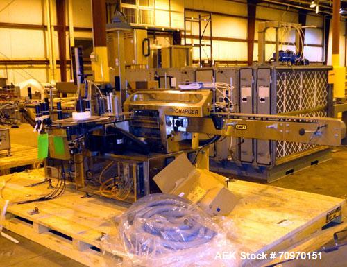 Used New Jersey Machine Charger Model NJM/CLI-334 Pressure Sensitive Front / Back / Wraparound Labeler. Capable of speeds up to 400 COM. Container size range: (Height) 1" - 14" or 25.4mm - 355.8mm (D...