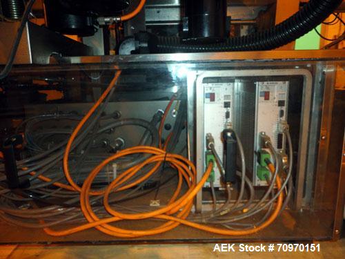 Used New Jersey Machine Charger Model NJM/CLI-334 Pressure Sensitive Front / Back / Wraparound Labeler. Capable of speeds up to 400 COM. Container size range: (Height) 1" - 14" or 25.4mm - 355.8mm (D...