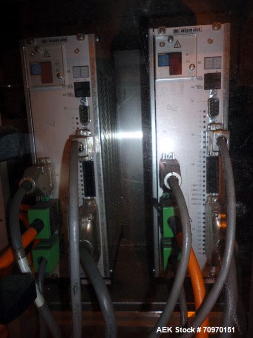Used New Jersey Machine Charger Model NJM/CLI-334 Pressure Sensitive Front / Back / Wraparound Labeler. Capable of speeds up to 400 COM. Container size range: (Height) 1" - 14" or 25.4mm - 355.8mm (D...