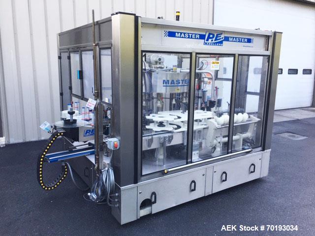Used P.E. Master 12 Station Rotary Pressure Sensitive Labeler.