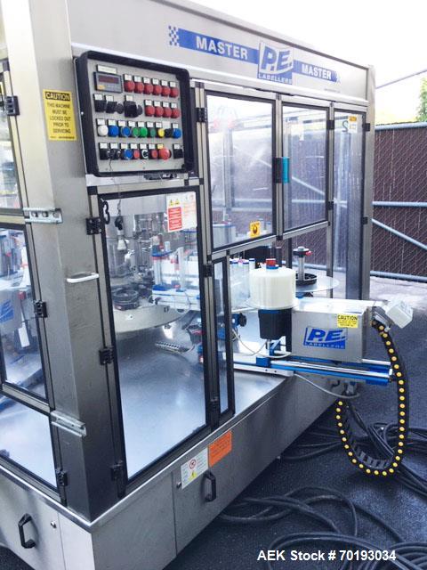 Used P.E. Master 12 Station Rotary Pressure Sensitive Labeler.