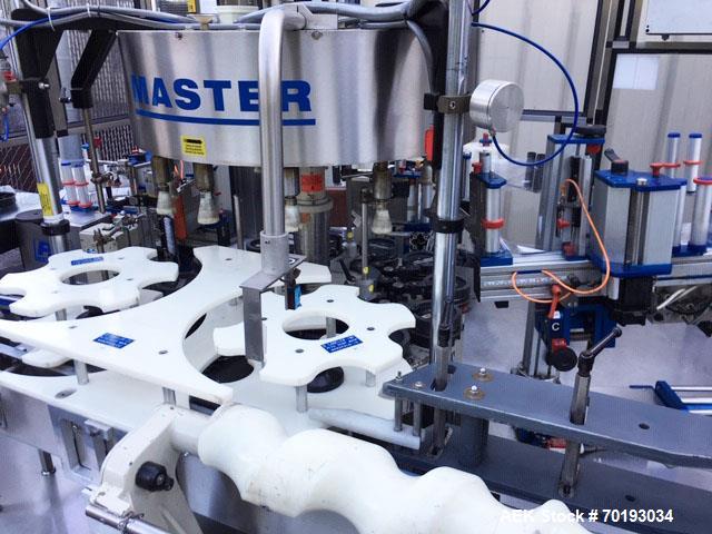 Used P.E. Master 12 Station Rotary Pressure Sensitive Labeler.