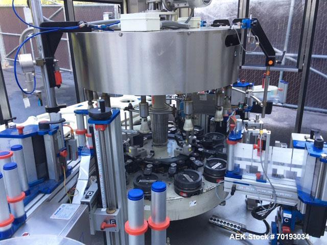 Used P.E. Master 12 Station Rotary Pressure Sensitive Labeler.