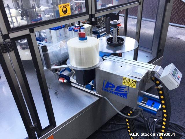 Used P.E. Master 12 Station Rotary Pressure Sensitive Labeler.