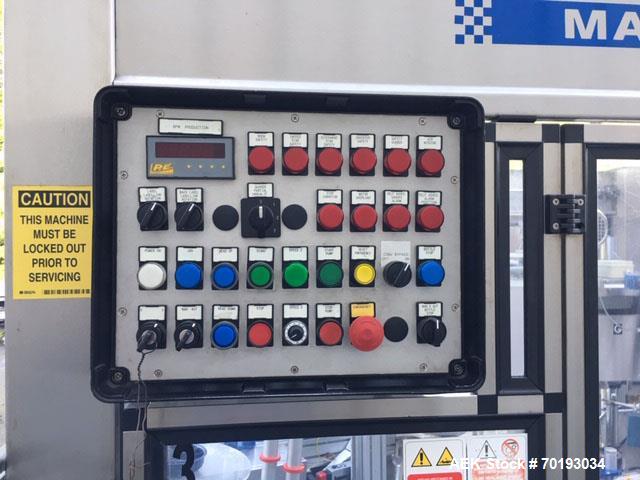 Used P.E. Master 12 Station Rotary Pressure Sensitive Labeler.