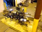 Used New Jersey Machine Charger Model NJM/CLI-334 Pressure Sensitive Front / Back / Wraparound Labeler. Capable of speeds up to 400 COM. Container size range: (Height) 1