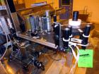 Used New Jersey Machine Charger Model NJM/CLI-334 Pressure Sensitive Front / Back / Wraparound Labeler. Capable of speeds up to 400 COM. Container size range: (Height) 1