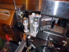 Used New Jersey Machine Charger Model NJM/CLI-334 Pressure Sensitive Front / Back / Wraparound Labeler. Capable of speeds up to 400 COM. Container size range: (Height) 1