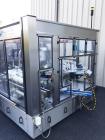 Used P.E. Master 12 Station Rotary Pressure Sensitive Labeler.