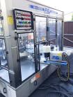 Used P.E. Master 12 Station Rotary Pressure Sensitive Labeler.