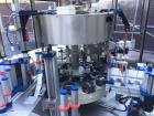 Used P.E. Master 12 Station Rotary Pressure Sensitive Labeler.