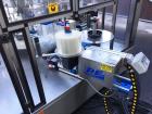 Used P.E. Master 12 Station Rotary Pressure Sensitive Labeler.