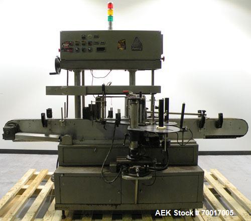 Used Avery 8000 Series Front and Back Pressure Sensitive Labeler, Model UL III F/B. Has top hold down, bump wheel container spacing and 6" high label unwind. 3" wide x 96" long plastic belt conveyor....