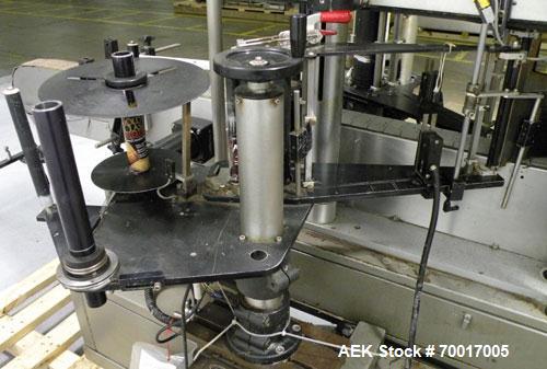Used Avery 8000 Series Front and Back Pressure Sensitive Labeler, Model UL III F/B. Has top hold down, bump wheel container spacing and 6" high label unwind. 3" wide x 96" long plastic belt conveyor....