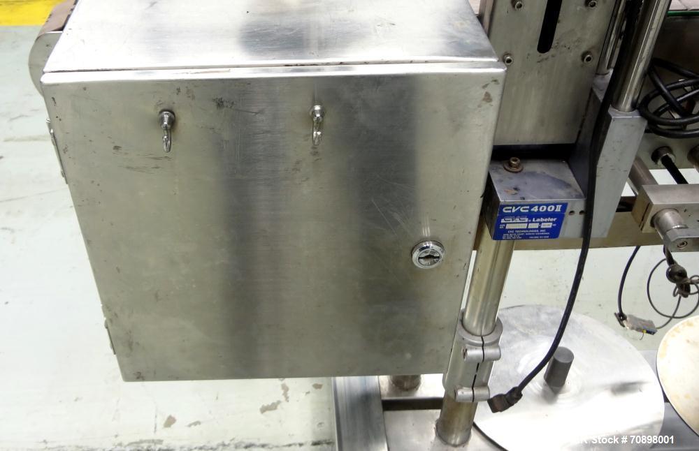 Used CVC 400 II Front and Back Pressure Sensitive Labeler. Capable of up to 250 bottles per minute. Will apply labels in length of " to 6-23/32", product width of 1-3/8" to 7-1/4". Can apply labels f...