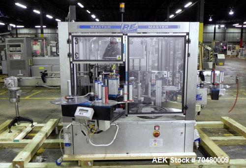 Used P.E. Labellers Six Head Rotary Labeler Model Master M With Dual Model M60 DX 150 Labelling Heads. Capable of Running Front and Back or Wraparound Pressure Sensitive Labels. Six (6) Bottle Plates...