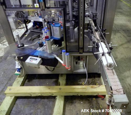Used P.E. Labellers Six Head Rotary Labeler Model Master M With Dual Model M60 DX 150 Labelling Heads. Capable of Running Front and Back or Wraparound Pressure Sensitive Labels. Six (6) Bottle Plates...