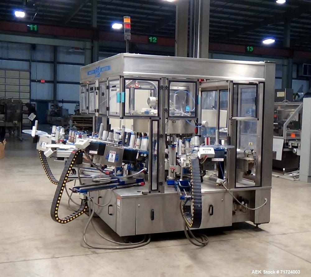 Used P.E. Labeler Non-Stop Front and Back Rotary Pressure Sensitive Labeler