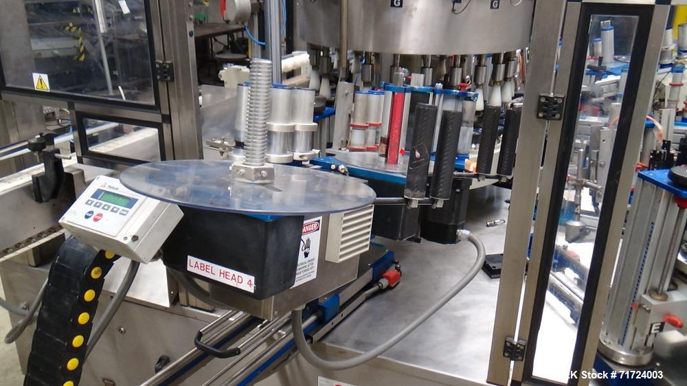 Used P.E. Labeler Non-Stop Front and Back Rotary Pressure Sensitive Labeler