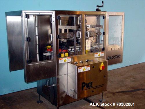 Used PE Master M Model MS12T77002S2E12 Head Pressure Sensitive Front and Back Rotary Labeler. Machine has clear label sensors and an Allen Bradley (AB) Panel View 600 control panel. Machine is equipp...