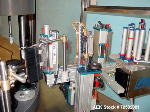 Used PE Master M Model MS12T77002S2E12 Head Pressure Sensitive Front and Back Rotary Labeler. Machine has clear label sensors and an Allen Bradley (AB) Panel View 600 control panel. Machine is equipp...