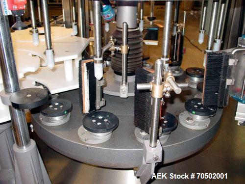 Used PE Master M Model MS12T77002S2E12 Head Pressure Sensitive Front and Back Rotary Labeler. Machine has clear label sensors and an Allen Bradley (AB) Panel View 600 control panel. Machine is equipp...