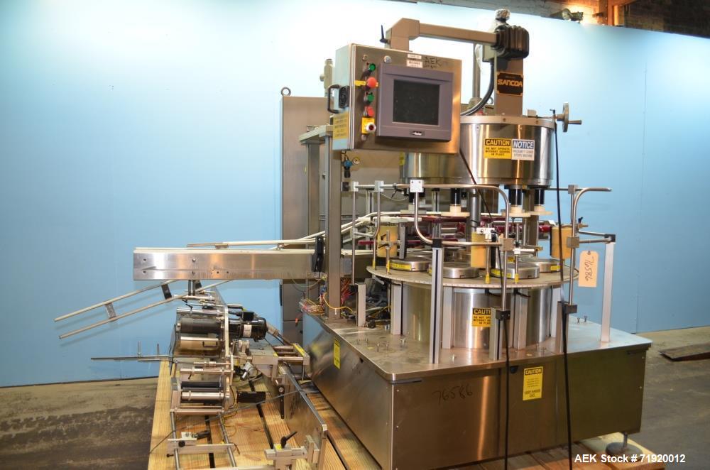 Used Sancoa Weiler 3-Head, 7-Station Pressure Sensitive Rotary Labeler