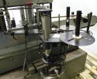 Used Avery 8000 Series Front and Back Pressure Sensitive Labeler, Model UL III F/B. Has top hold down, bump wheel container spacing and 6