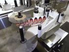 Used Kalish Labelit Front-Back & Wraparound Pressure Sensitive Labeler. Capable of speeds up to 100 BPM. Has bump wheel infeed, 4-1/2