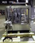 Used P.E. Labellers Six Head Rotary Labeler Model Master M With Dual Model M60 DX 150 Labelling Heads. Capable of Running Front and Back or Wraparound Pressure Sensitive Labels. Six (6) Bottle Plates...
