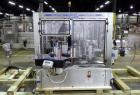 Used P.E. Labellers Six Head Rotary Labeler Model Master M With Dual Model M60 DX 150 Labelling Heads. Capable of Running Front and Back or Wraparound Pressure Sensitive Labels. Six (6) Bottle Plates...