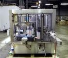 Used P.E. Labellers Six Head Rotary Labeler Model Master M With Dual Model M60 DX 150 Labelling Heads. Capable of Running Front and Back or Wraparound Pressure Sensitive Labels. Six (6) Bottle Plates...