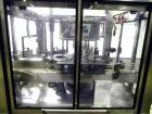 Used P.E. Labellers Six Head Rotary Labeler Model Master M With Dual Model M60 DX 150 Labelling Heads. Capable of Running Front and Back or Wraparound Pressure Sensitive Labels. Six (6) Bottle Plates...