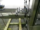 Used P.E. Labellers Six Head Rotary Labeler Model Master M With Dual Model M60 DX 150 Labelling Heads. Capable of Running Front and Back or Wraparound Pressure Sensitive Labels. Six (6) Bottle Plates...