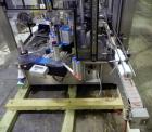 Used P.E. Labellers Six Head Rotary Labeler Model Master M With Dual Model M60 DX 150 Labelling Heads. Capable of Running Front and Back or Wraparound Pressure Sensitive Labels. Six (6) Bottle Plates...